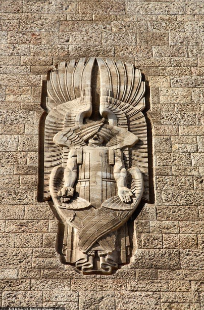 Seraphim Sculpture on Building Facade